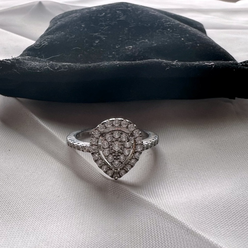 Teardrop diamond chipped ring size 8